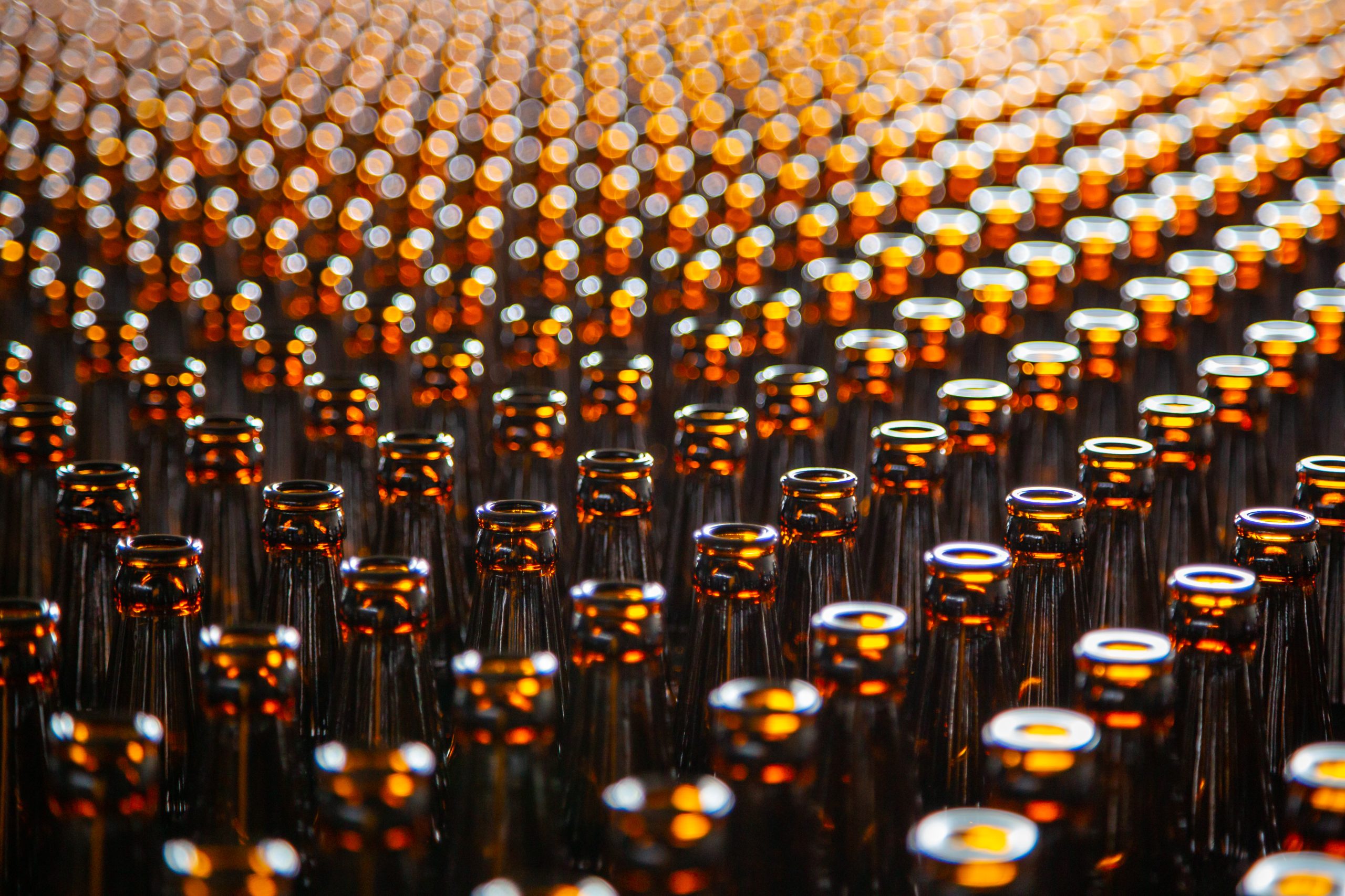 Glass bottle at factory for production of glass containers. Glass bottle texture
